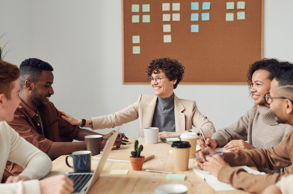 Group of coworkers at a boardroom table.